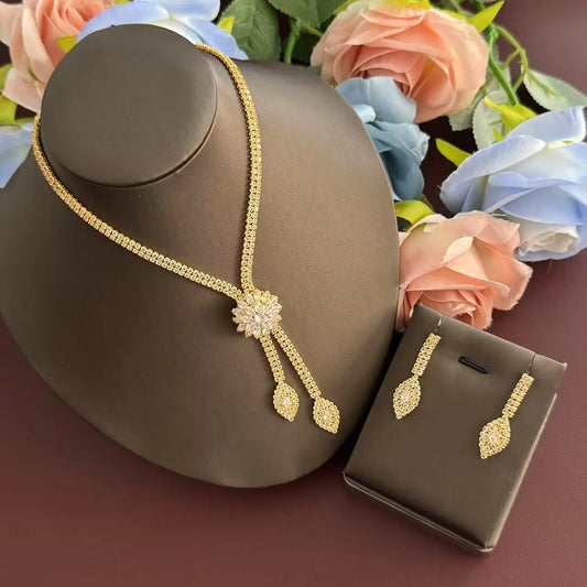 A three piece jewelry set with exquisite patterns and stunning necklaces and earrings, perfect for parties and banquets