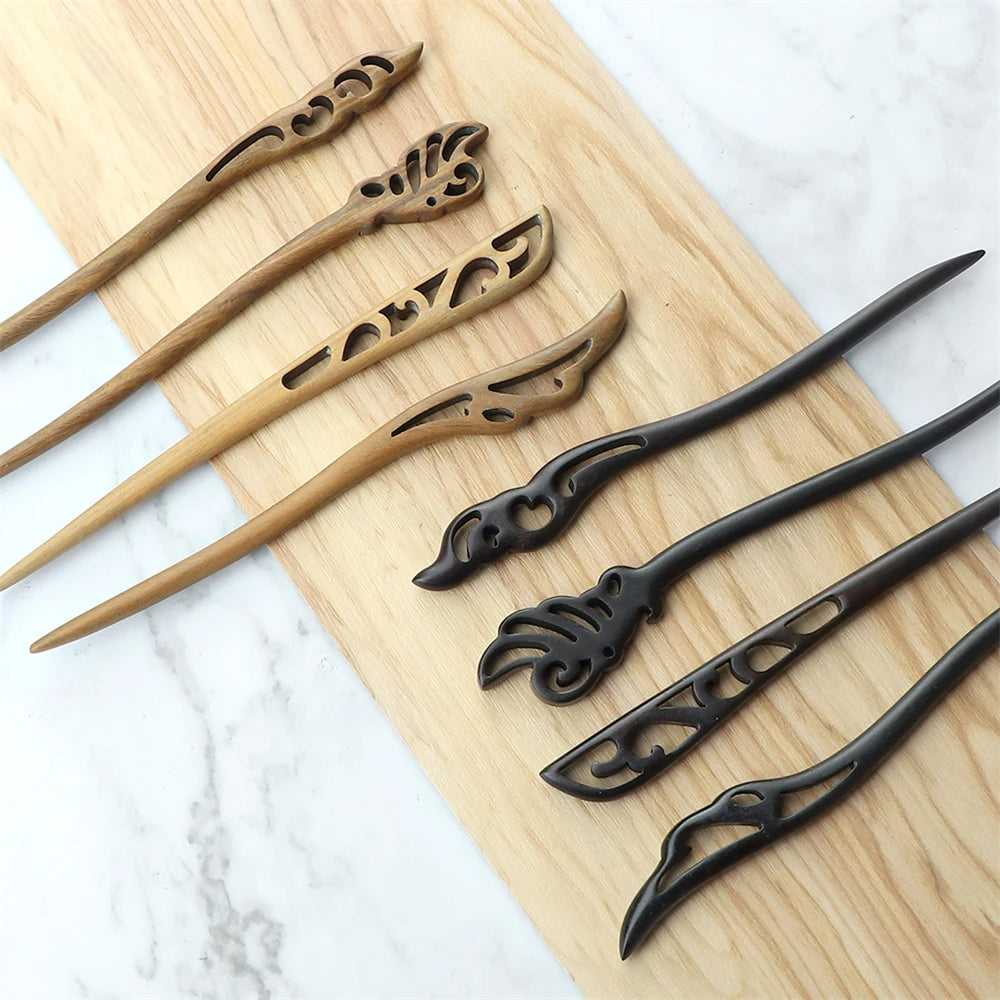 Chinese ethnic style hair sticks in natural sandalwood brown and black, carved ornamental ends for women