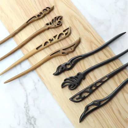 Chinese ethnic style hair sticks in natural sandalwood brown and black, carved ornamental ends for women