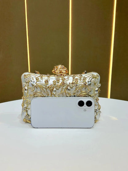 White crystal-embellished banquet clutch with gold-tone floral embroidery for evening wear