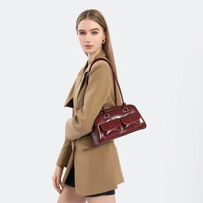 Edenista women's burgundy leather bowling bag with multiple pockets and shoulder strap