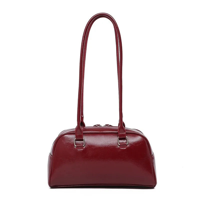 Women's burgundy patent leather bowling bag with double top handles