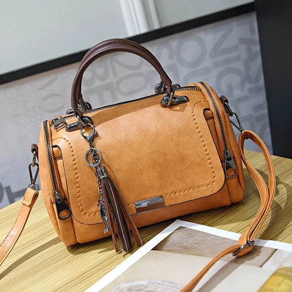 Edenista tan leather retro shoulder bag with floral pendant and tassel decor