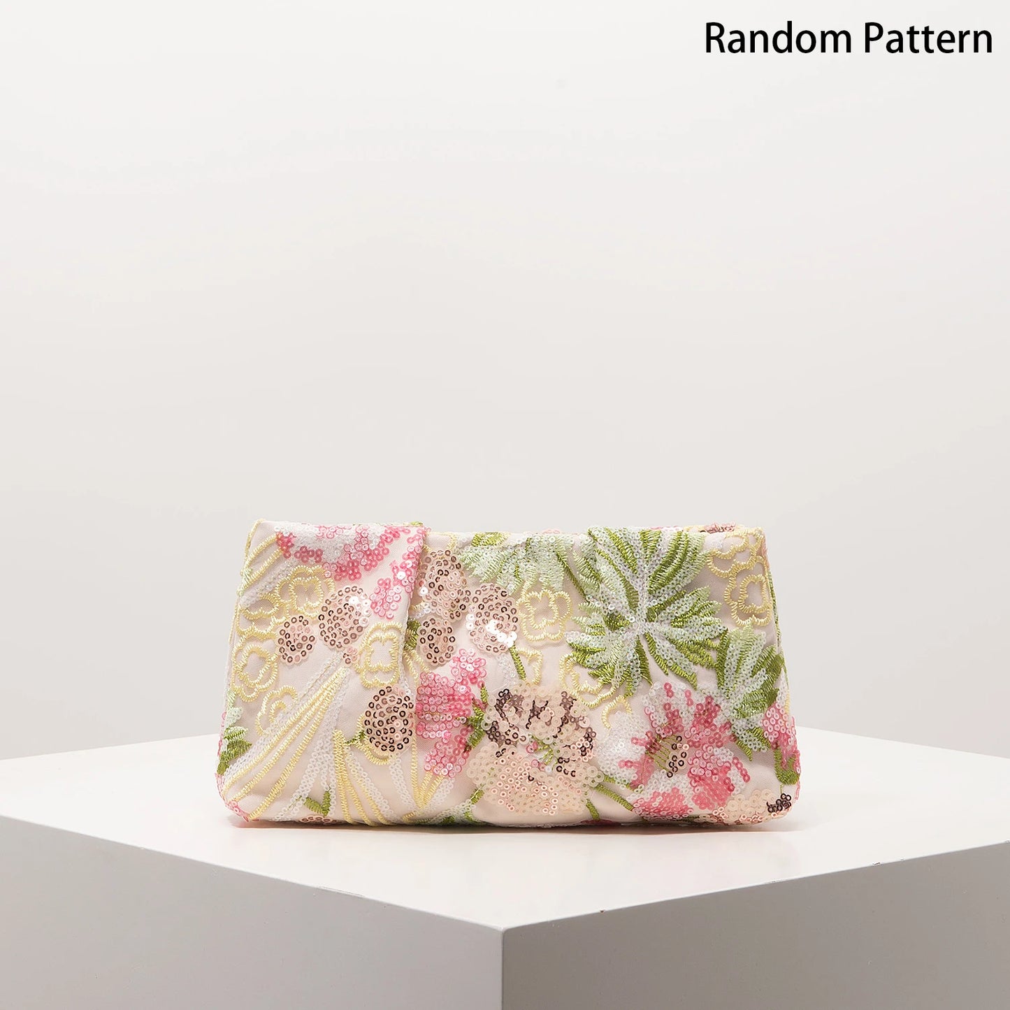 Edenista clutch bag with floral sequin embroidery in pastel pink and green