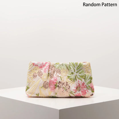 Edenista clutch bag with floral sequin embroidery in pastel pink and green