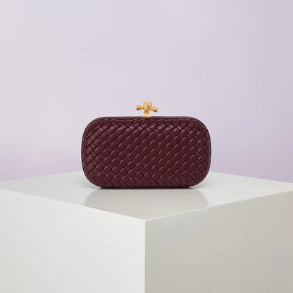 Edenista burgundy woven PU evening bag with gold-tone clasp, boxy clutch for handheld use