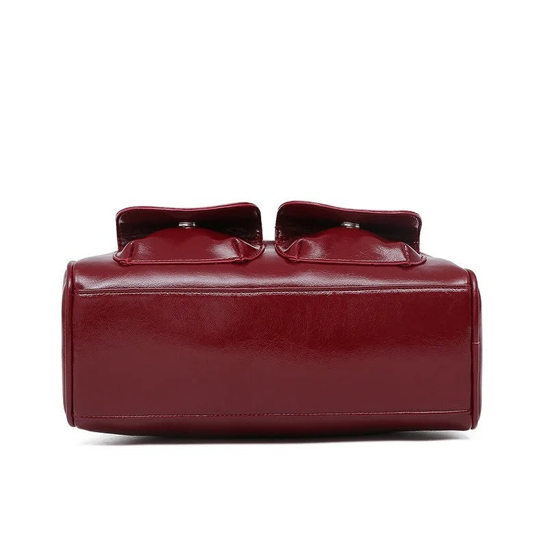 Edenista women's burgundy leather bowling bag with dual top handles