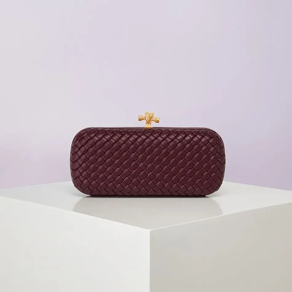 Crossbody bag, burgundy woven PU with gold-tone clasp, compact boxy design
