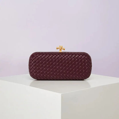 Crossbody bag, burgundy woven PU with gold-tone clasp, compact boxy design