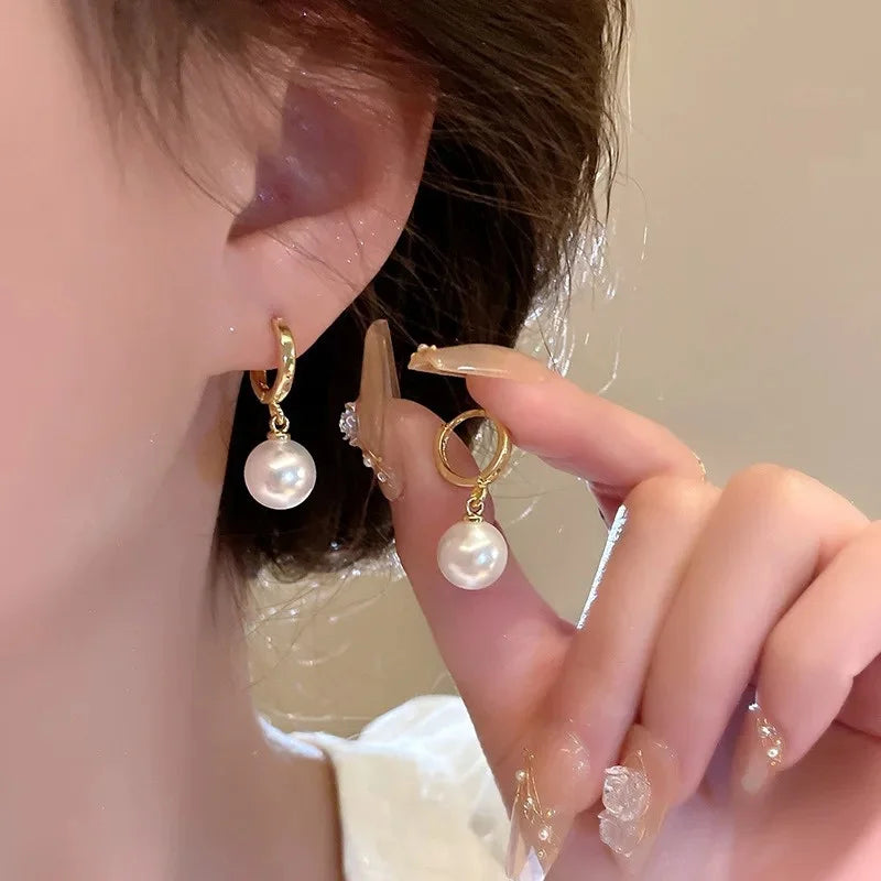 Gold-plated imitation pearl zircon hoop earrings by Edenista, a pair with pearl drops