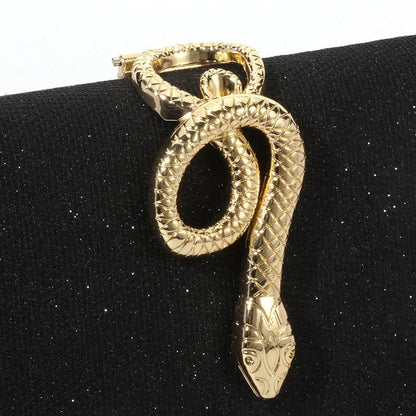 Classic Snake Buckle Evening Purse by Edenista; gold-tone snake buckle on black glitter clutch