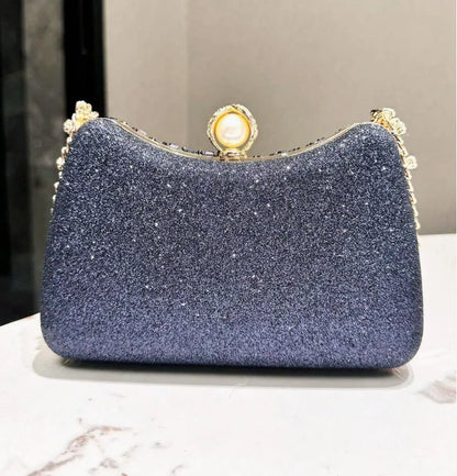 Edenista blue glitter rhinestone evening clutch with pearl clasp and gold frame