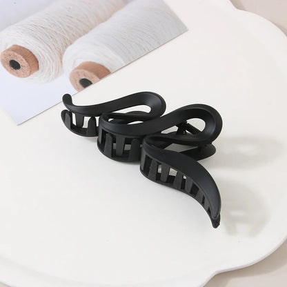 Hair claw clips set of 3 in black acrylic, large size with geometric curved design