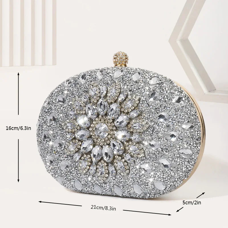 Round crystal-embellished evening bag; silver glitter clutch with chain strap, 21cm long.