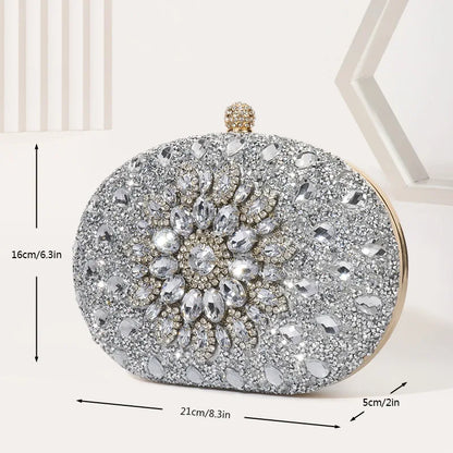 Round crystal-embellished evening bag; silver glitter clutch with chain strap, 21cm long.