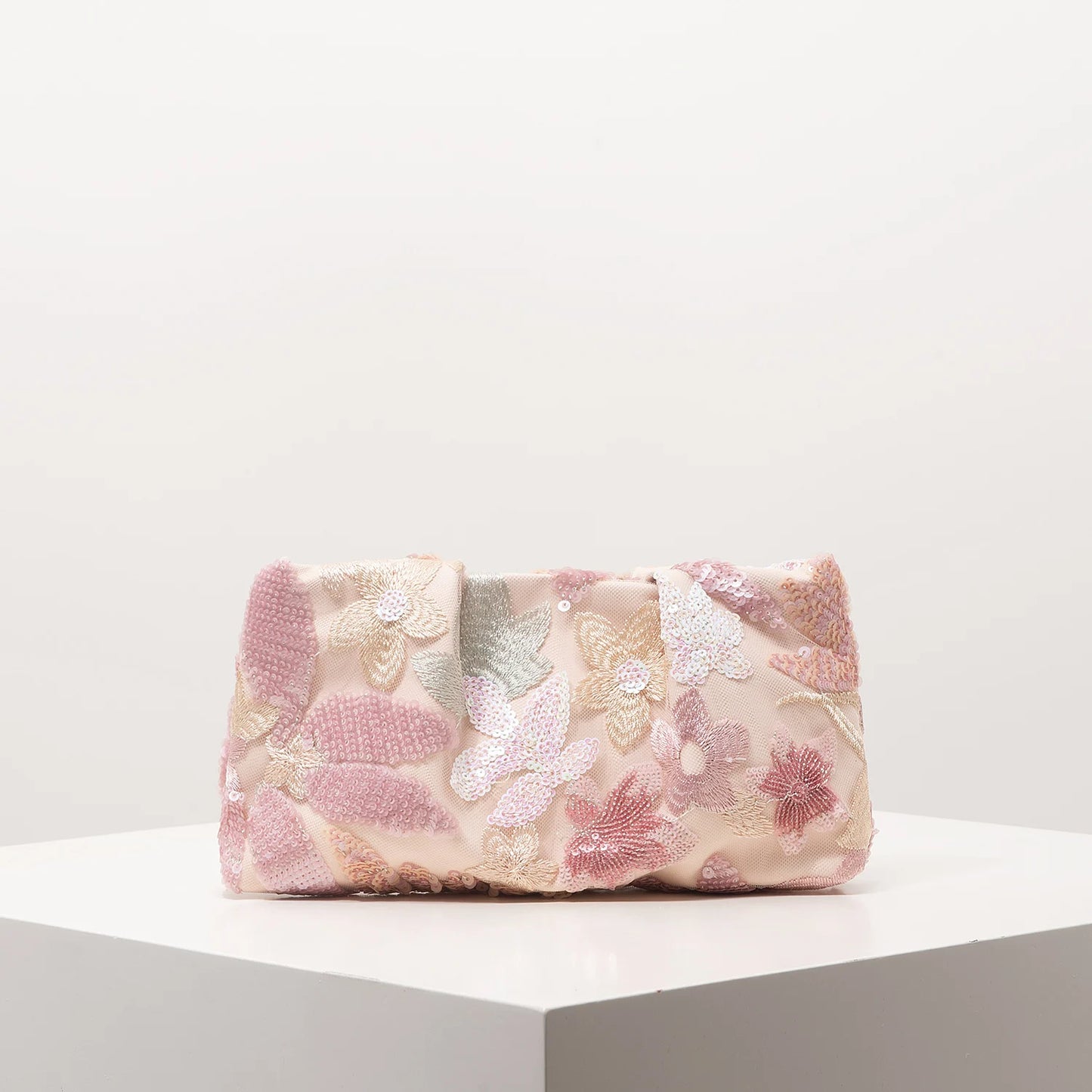 Edenista pink sequin embroidered clutch bag with floral appliqué, ideal for gala and wedding events