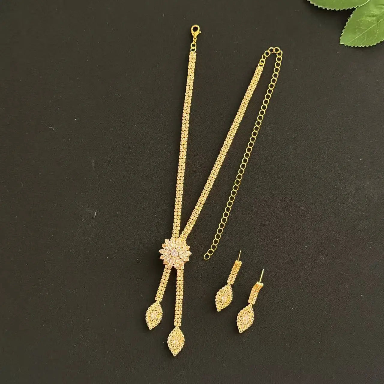 Three piece jewelry set with exquisite patterns and stunning necklaces and earrings by edenista