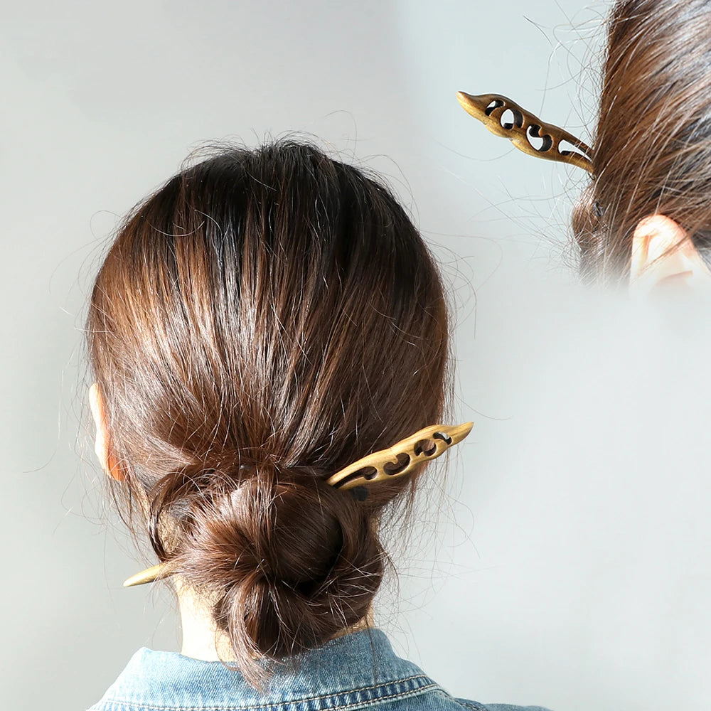 Chinese ethnic style hair sticks, two green sandalwood sticks worn in a bun