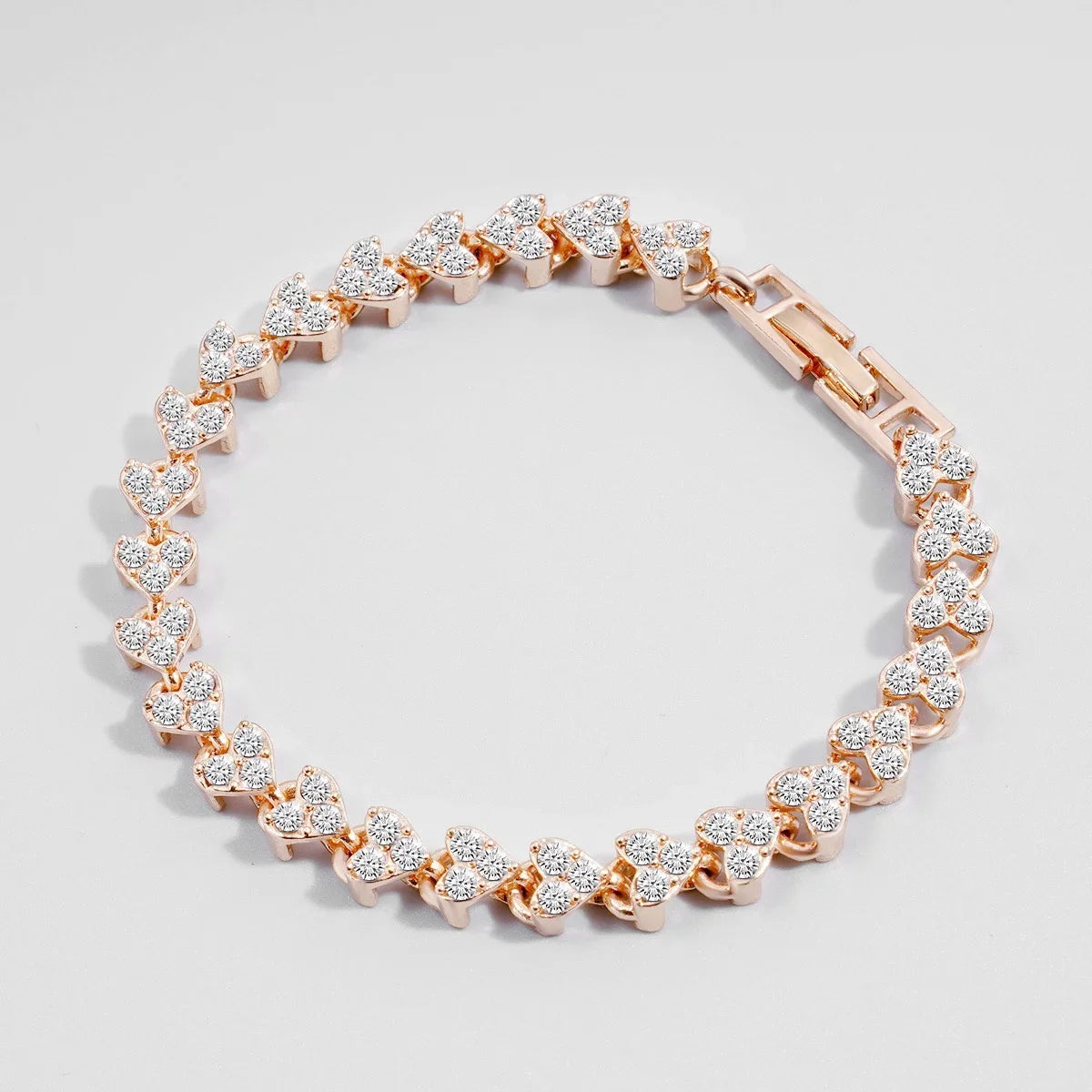 Bracelet Edenista rose-gold crystal heart with geometric chain links and rhinestones