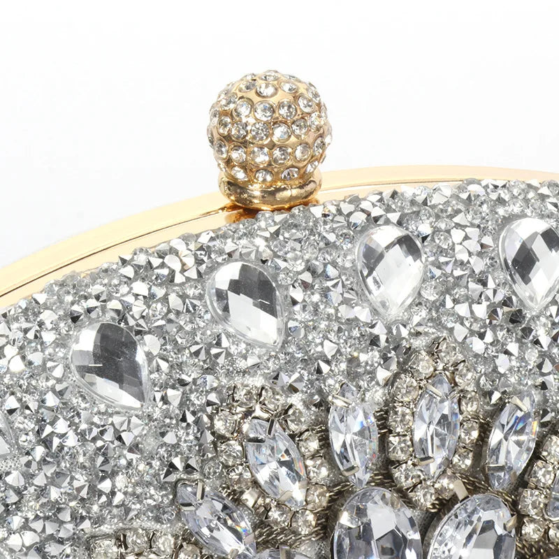 Edenista luxury evening clutch bag with glittering rhinestones, crystal teardrop accents, gold-tone frame.