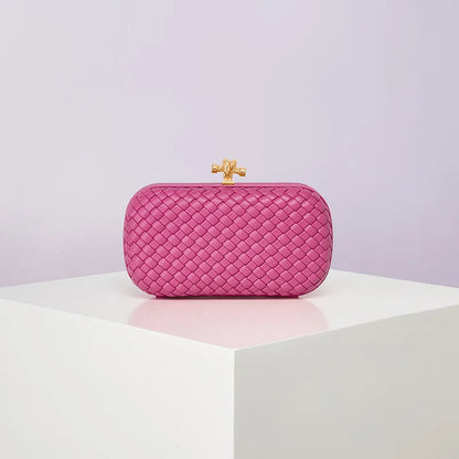Pink woven PU crossbody evening bag with gold-tone clasp