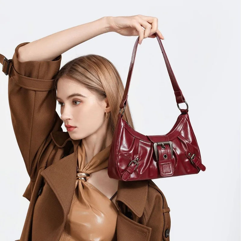 Edenista women's burgundy leather hobo bag with buckle straps and pleated detailing