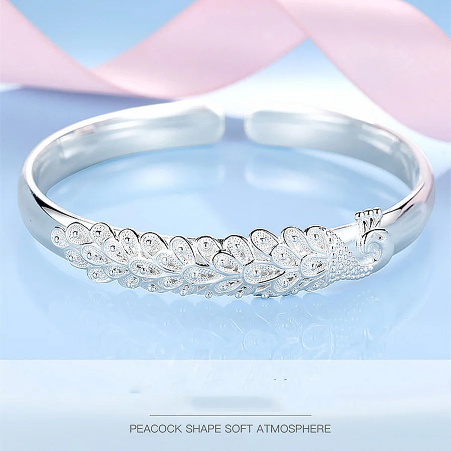 Peacock motif open-ended bracelet in 925 sterling silver by Edenista