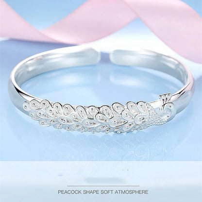 Peacock motif open-ended bracelet in 925 sterling silver by Edenista