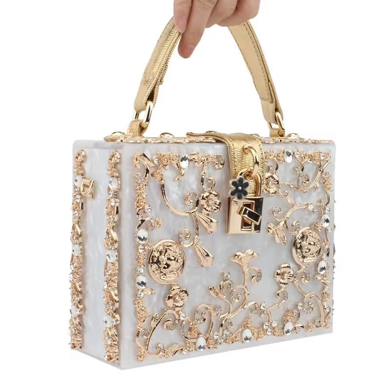 Acrylic evening bag by Edenista with gold-tone floral embroidery and rhinestones