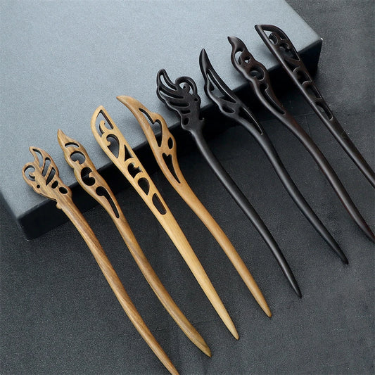 Chinese ethnic style hair sticks, set of eight in natural sandalwood and black finishes.