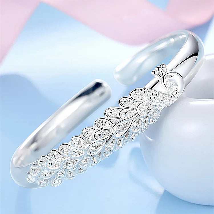 Peacock feather opening screen bracelet in 925 sterling silver by Edenista