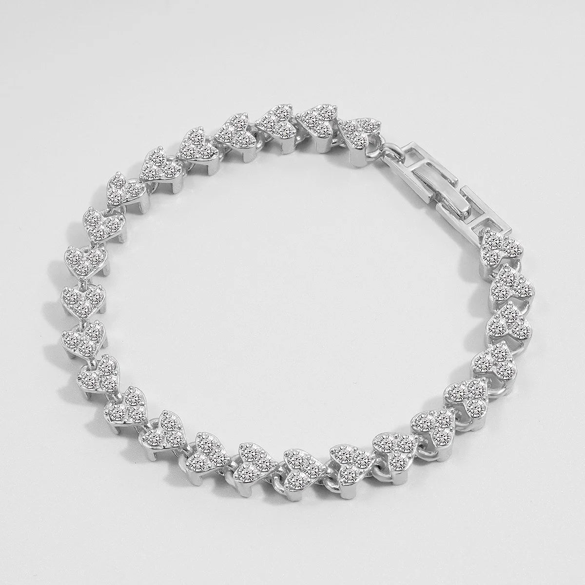 Crystal heart-link bracelet for women by Edenista, silver-tone with rhinestones