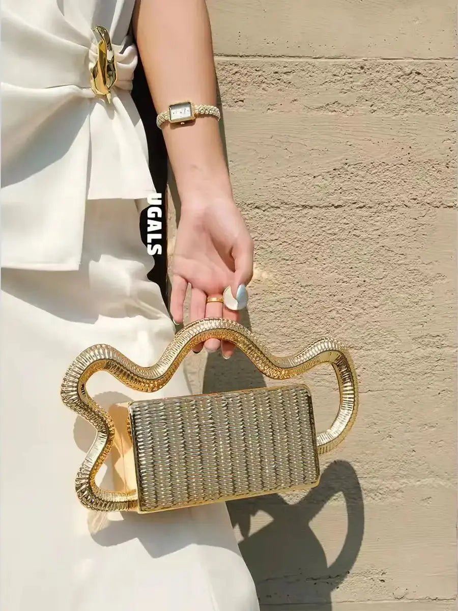 Clutch purse by Edenista; gold woven texture with a wavy gold frame handle, evening bag for women