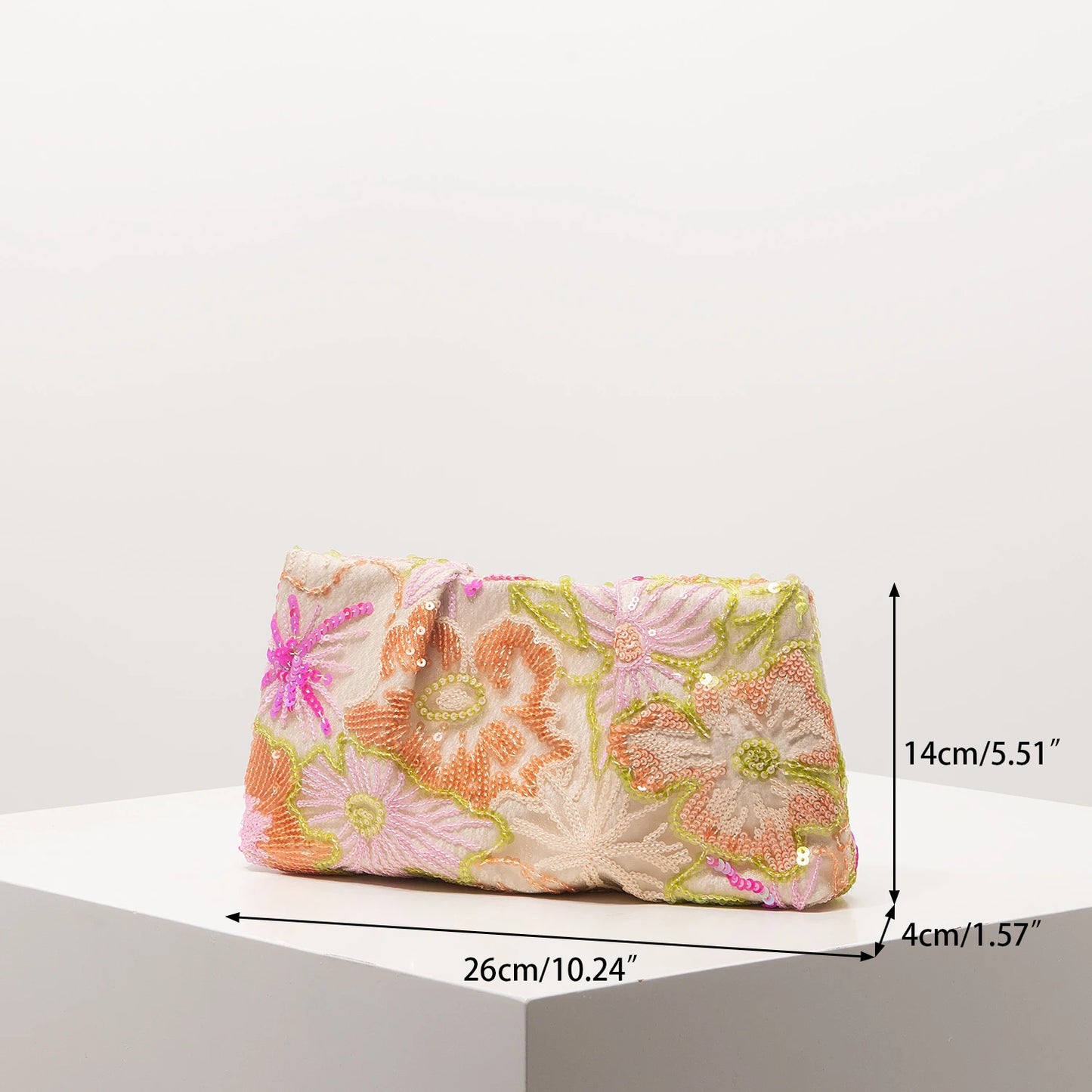 Clutch bag by Edenista with colorful sequin floral embroidery on cream fabric