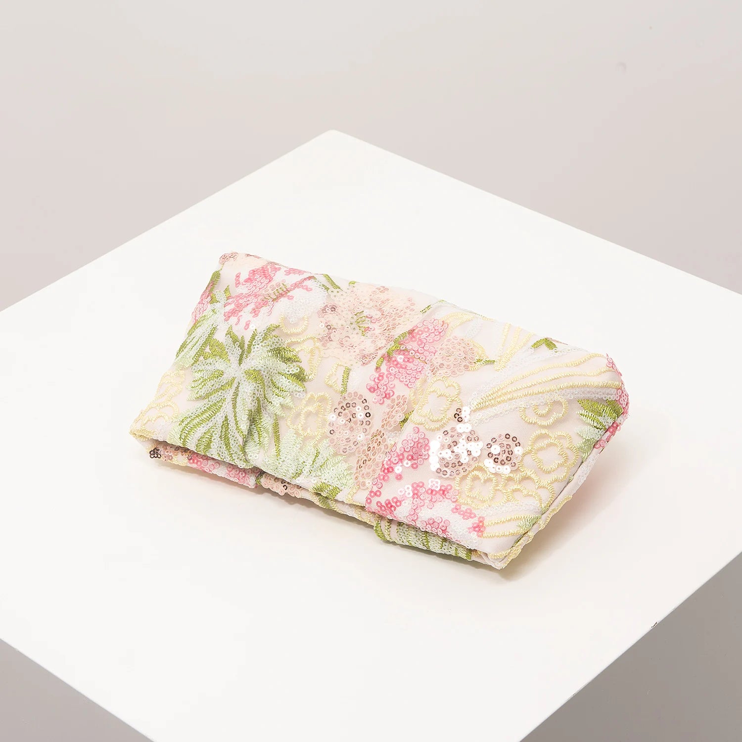 Sequin clutch bag Edenista; pastel floral embroidery on pale pink fabric for gala and prom outfits