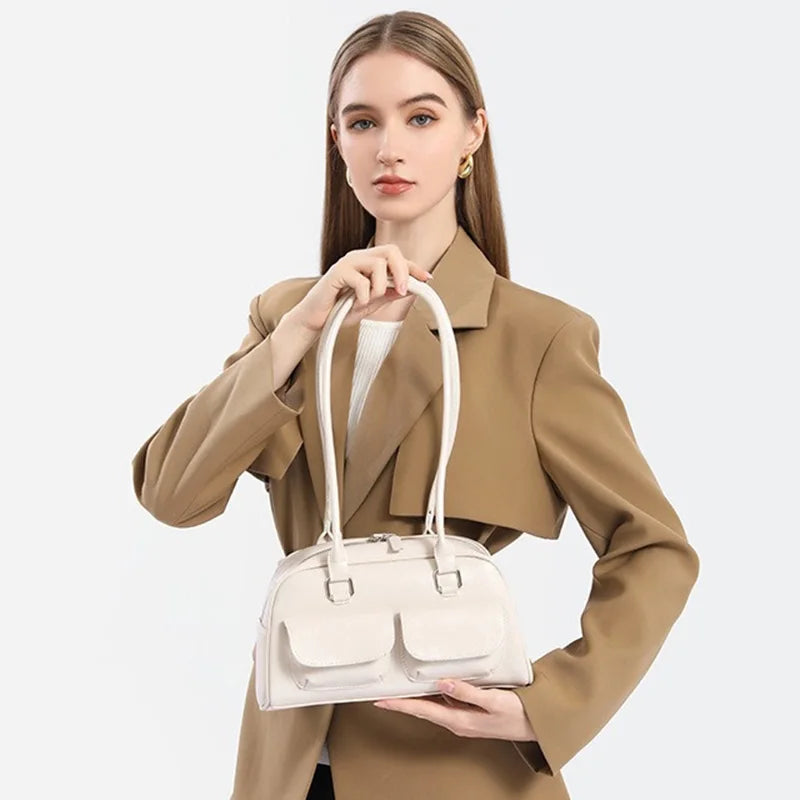Edenista white bowling bag for women with front pocket flaps and dual top handles