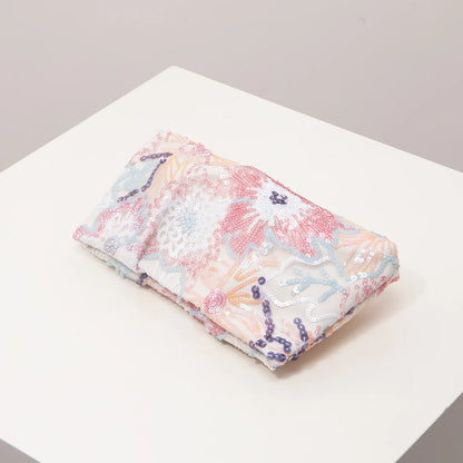 Clutch bag with pastel floral sequin embroidery in pink, peach and blue
