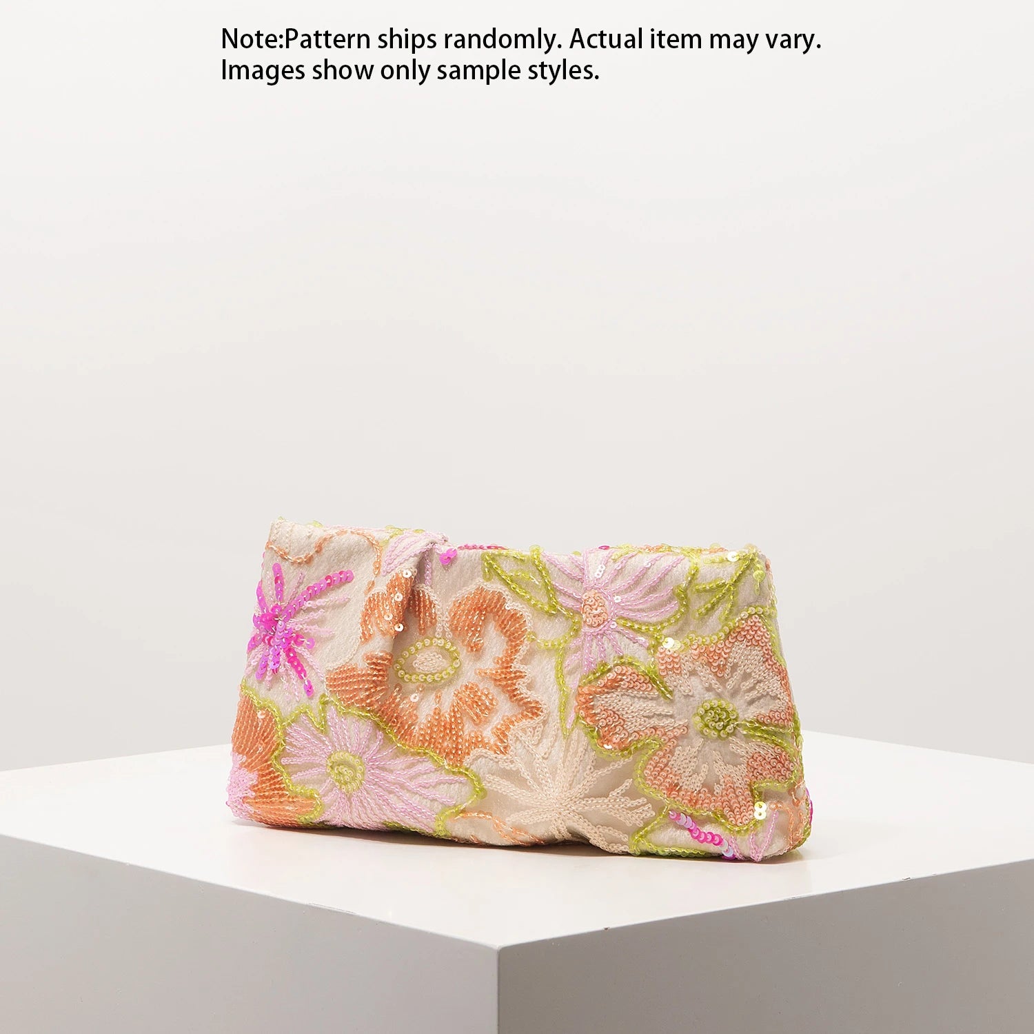 Edenista clutch bag with multicolor floral embroidery and sequin details