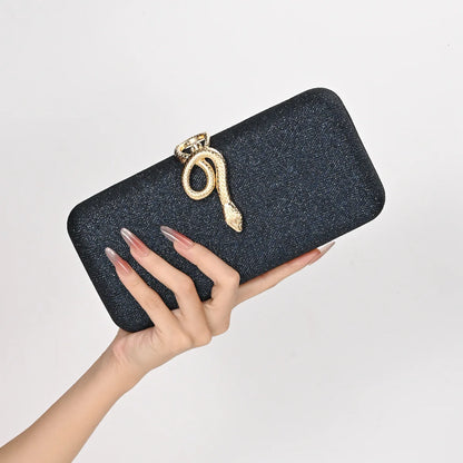 Edenista classic snake-buckle evening clutch in glittery black with gold snake ornament