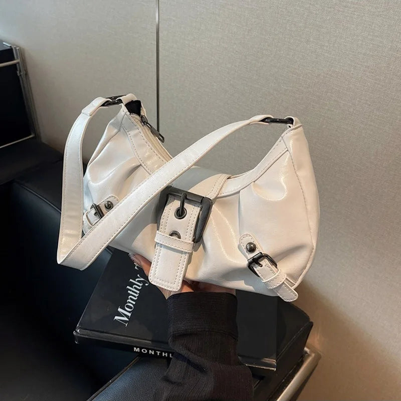 Hobo handbag in white faux-leather with buckle straps and top handles