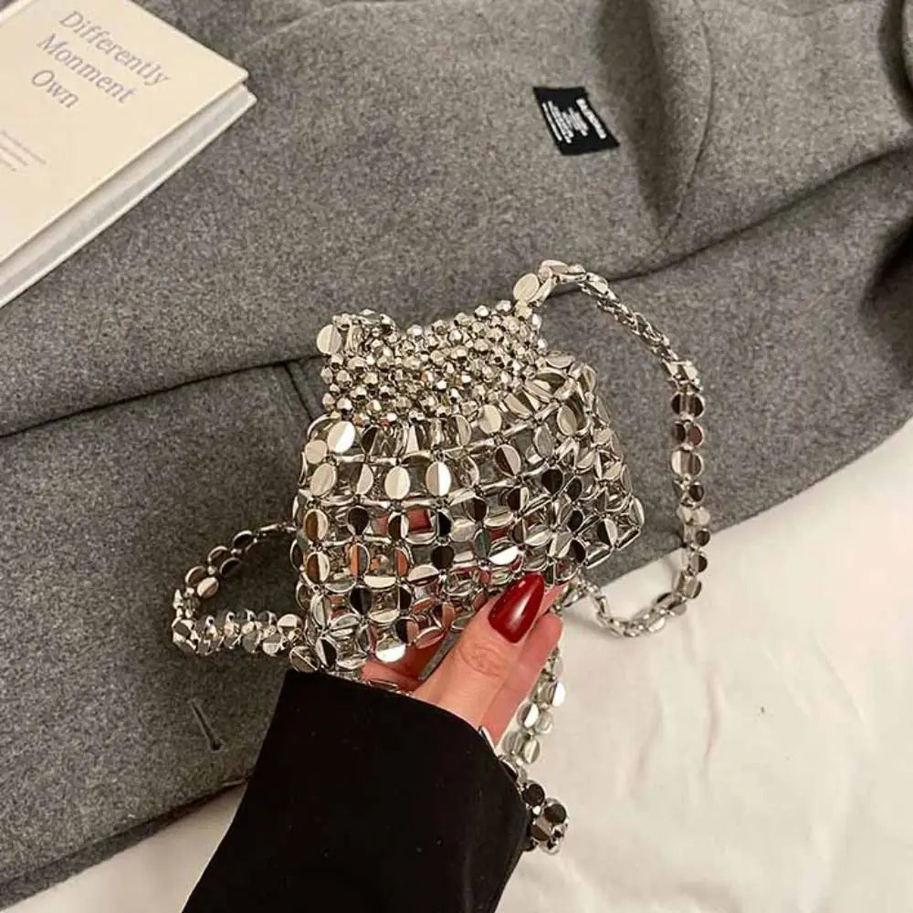 Edenista elegant sequin evening bag with silver reflective discs and a chain strap