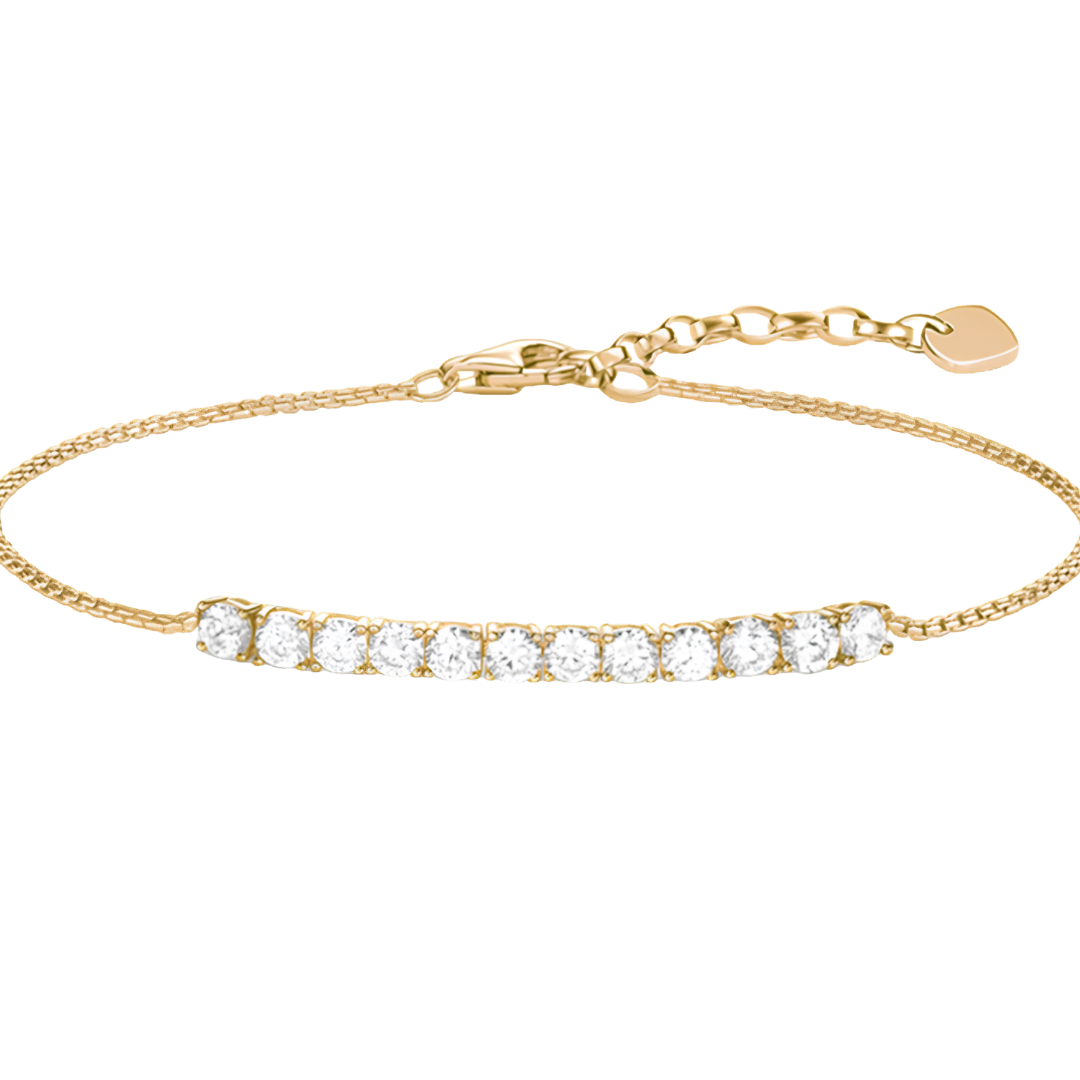 Bracelet by Edenista in gold-tone with a row of clear stones in a link chain design.