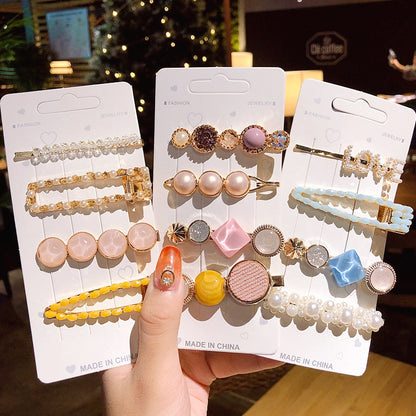 Girls' Simple Pearl Clip Set hair accessories on display cards; pastel pearl and rhinestone clips.