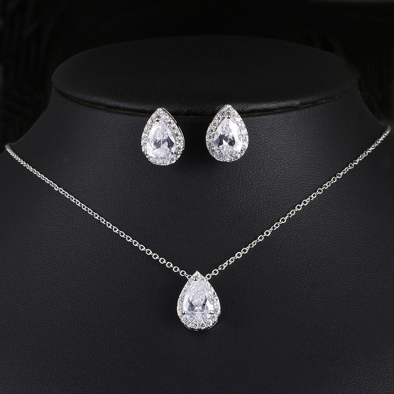 Water Drop Gemstone Jewelry Set, 3-piece: teardrop necklace and matching earrings in silver-tone with clear stones by CJ