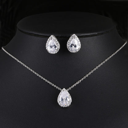Water Drop Gemstone Jewelry Set, 3-piece: teardrop necklace and matching earrings in silver-tone with clear stones by CJ