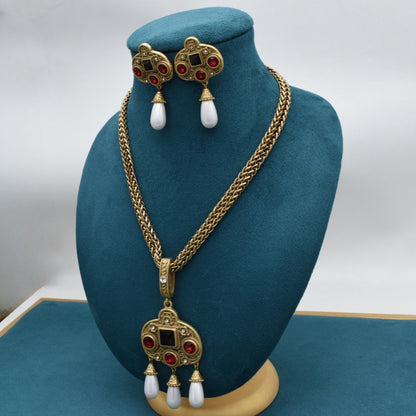 Vintage glass-inlaid tassel pearl necklace with matching gold-tone earrings, CJ brand