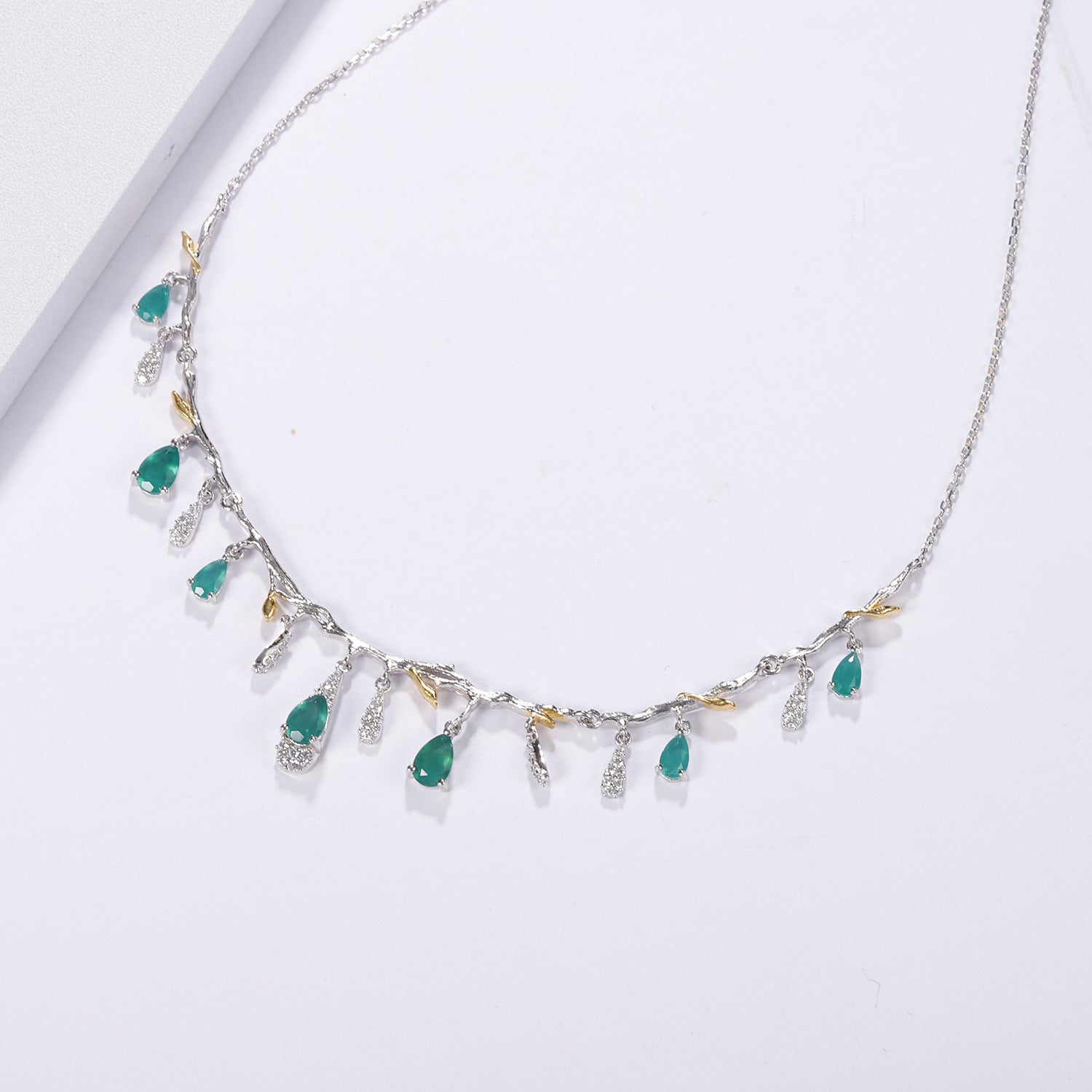 S925 silver natural topaz necklace with green teardrop topaz charms and clear crystals along a branch-like chain