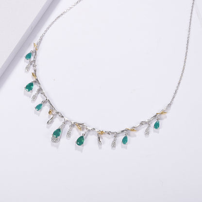 S925 silver natural topaz necklace with green teardrop topaz charms and clear crystals along a branch-like chain