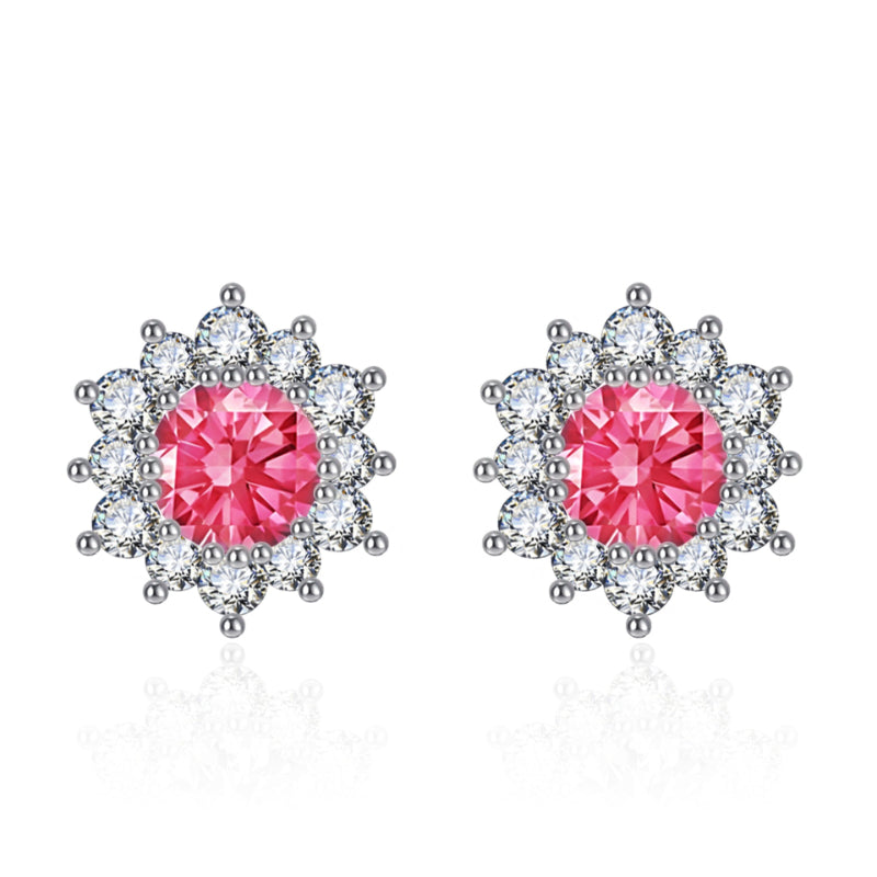Snowflake stud earrings pair with pink center stones and clear crystal halos in silver-tone metal