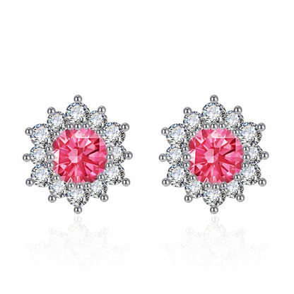 Snowflake stud earrings pair with pink center stones and clear crystal halos in silver-tone metal
